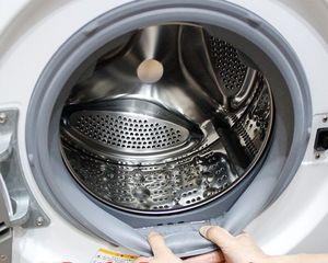 如何取出和打开滚筒洗衣机污垢槽（简单步骤）